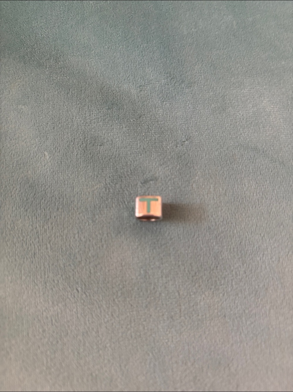 Tiffany and Co. Charm. Solid silver.